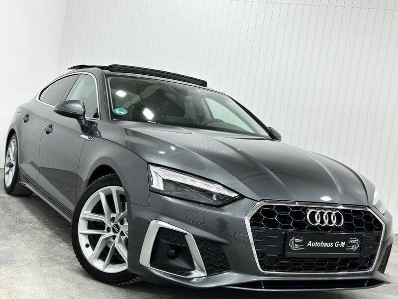 Grau Gebraucht 2024 Audi A5 Sportback S-Line Limousine | 35.950 € (Superpreis) - Bild 1/4