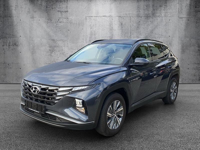 Grau Gebraucht 2021 Hyundai Tucson SUV | 20.980 € (Guter Preis) - Bild 1/4
