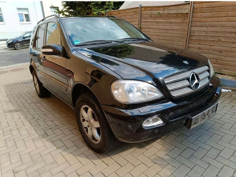 Obsidianschwarz metalliclack Gebraucht 2004 Mercedes ML270 SUV | 2.600 € (Superpreis) - Bild 1/4