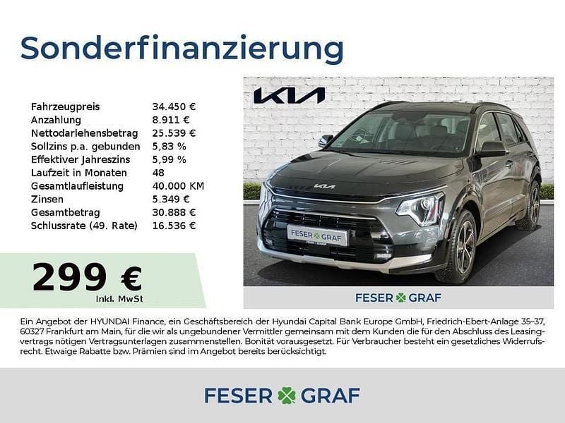 Interstellargrau Gebraucht 2025 Kia Niro Comfort SUV | 34.450 € (Superpreis) - Bild 1/4