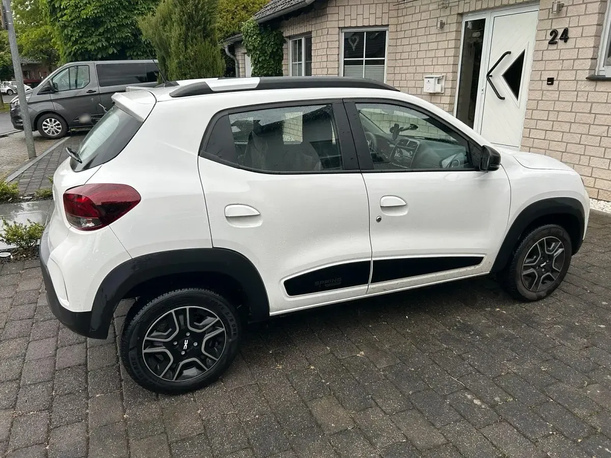 Gebraucht Dacia Spring 25 kW (34 PS) 2023 Weiß Kleinwagen
