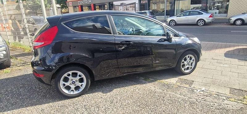 Gebraucht Ford Fiesta Trend 82 PS (60 kW) 2011 Schwarz Kleinwagen