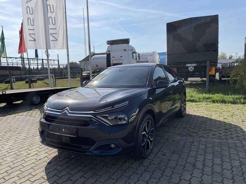 Obsidienschwarz Gebraucht 2021 Citroën e-C4 Shine Limousine | 25.780 € - Bild 1/4