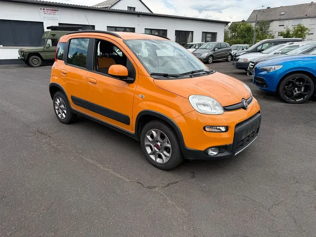 Gebraucht Fiat Panda 4x4 Rock 86 PS (63 kW) 2015 Arancio solare/zucca Kleinwagen