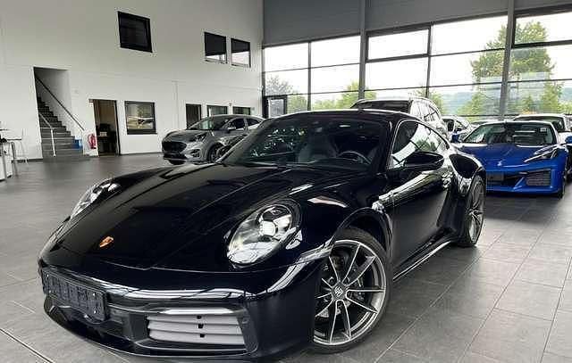 Schwarz Gebraucht 2023 Porsche 911 Carrera | 125.030 € (Etwas zu teuer) - Bild 1/4