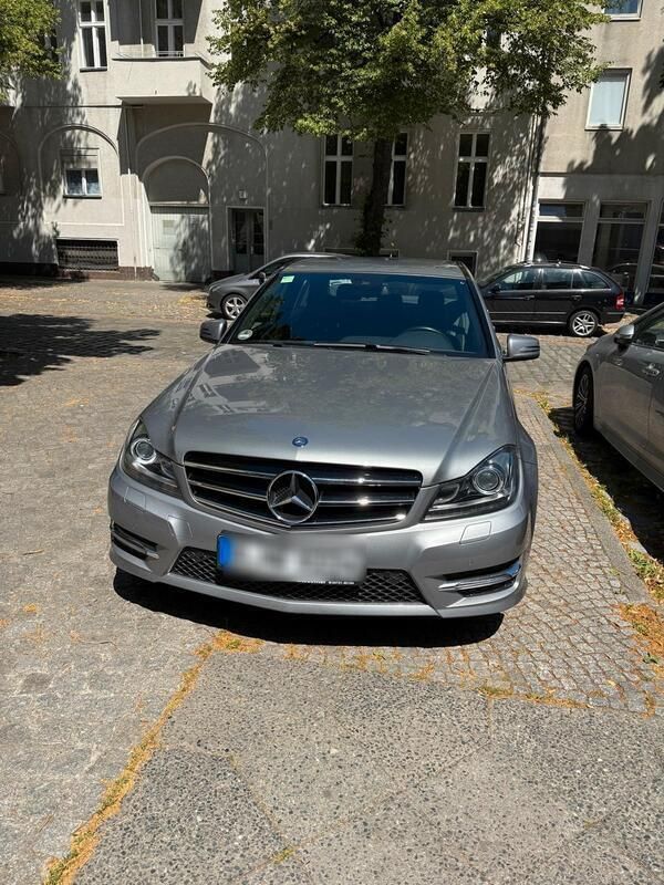 Grau Gebraucht 2014 Mercedes C180 Avantgarde Limousine | 12.490 € (Superpreis) - Bild 1/4