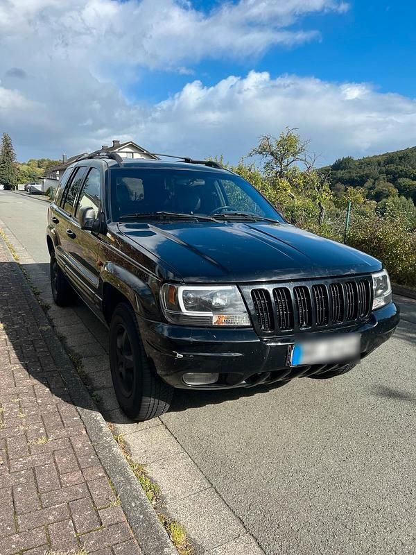Schwarz Gebraucht 1999 Jeep Grand Cherokee SUV | 6.100 € (Fairer Preis) - Bild 1/4