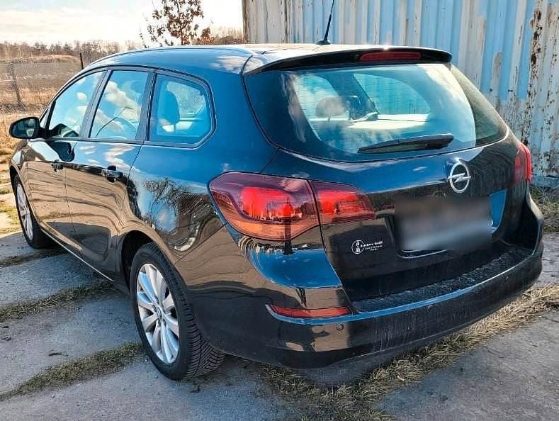 Gebraucht Opel Astra 125 PS (91 kW) 2011 Schwarz Kombi