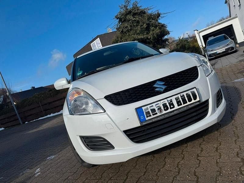 Gebraucht Suzuki Swift X-TRA 94 PS (69 kW) 2013 Weiß Kleinwagen
