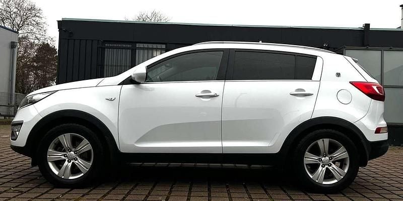 (wd) casa white s Gebraucht 2013 Kia Sportage Attract SUV | 7.999 € (Superpreis) - Bild 1/4