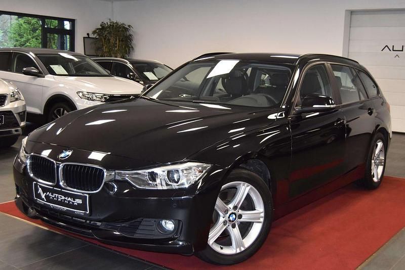 Schwarz Gebraucht 2013 BMW 320 Advantage Kombi | 11.499 € (Fairer Preis) - Bild 1/4