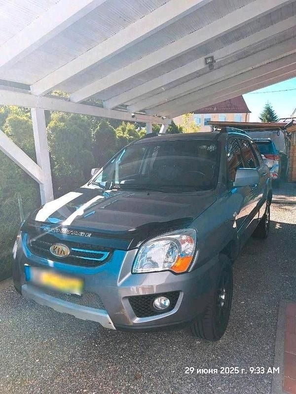 Grau Gebraucht 2009 Kia Sportage SUV | 5.097 € (Guter Preis) - Bild 1/4