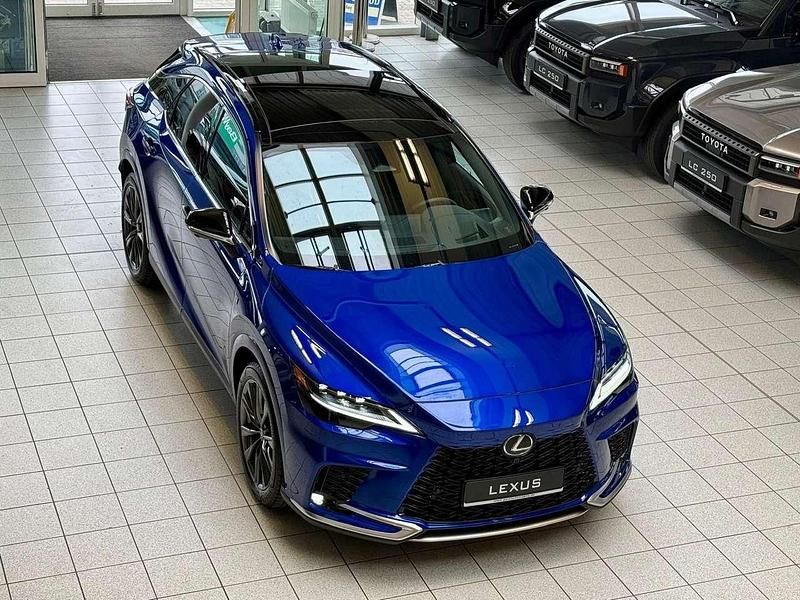 Flammblau mica 8x1 Gebraucht 2024 Lexus RX350 Sport Line SUV | 66.895 € (Fairer Preis) - Bild 1/4