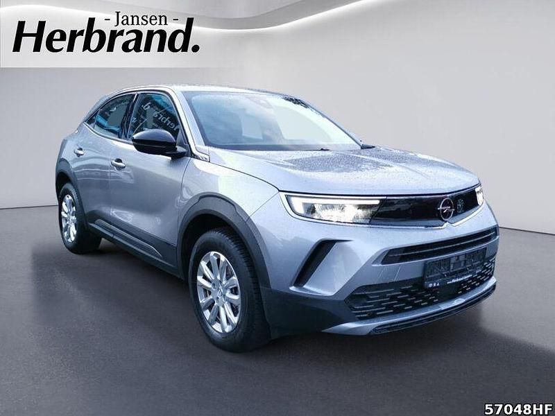 Gebraucht Opel Mokka-e Edition 100 kW (136 PS) 2022 Kontrast grau/quarz silber SUV