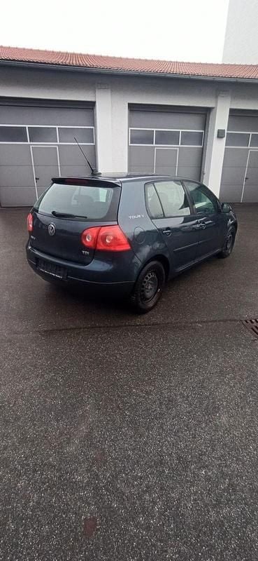 Second-hand VW Golf V 105 CP (77 kW) 2007 Albastru Berlinǎ