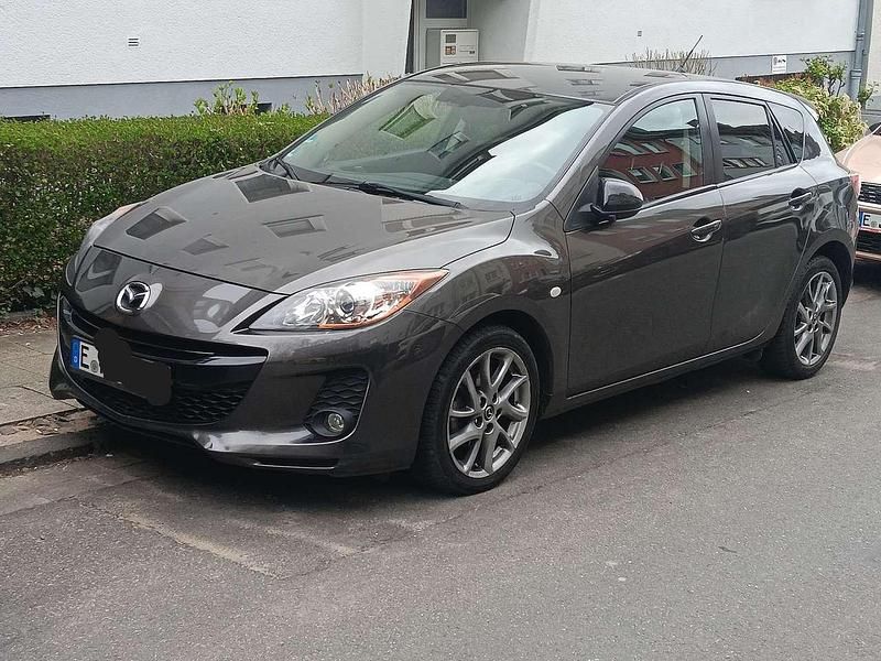 Grau Gebraucht 2013 Mazda 3 Kenko Limousine | 6.450 € (Teuer) - Bild 1/4