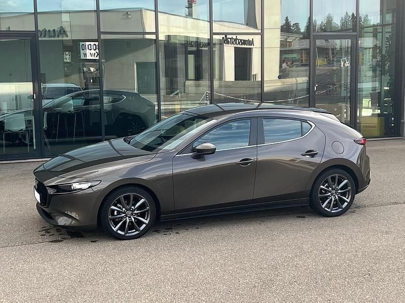 Grau Gebraucht 2019 Mazda 3 Selection Limousine | 19.650 € (Fairer Preis) - Bild 1/4