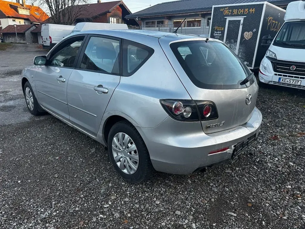 Second-hand Mazda 3 Active 105 CP (77 kW) 2006 Argintiu Berlinǎ