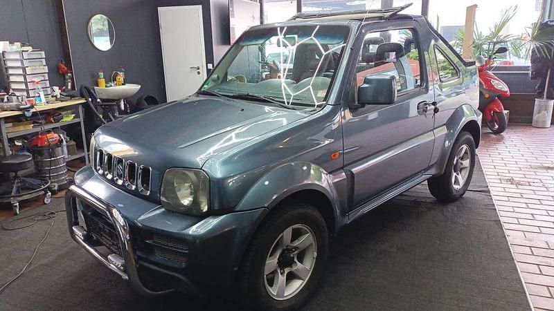 Grün Gebraucht 2008 Suzuki Jimny Club SUV | 6.999 € (Fairer Preis) - Bild 1/4