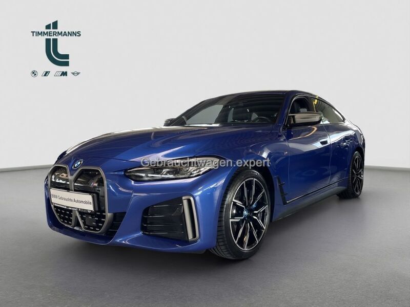 M portimao blau (metallic) Gebraucht 2023 BMW i4 Shadowline Limousine | 45.990 € - Bild 1/4