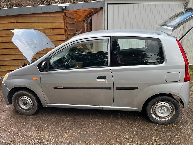 Gebraucht Daihatsu Cuore 58 PS (42 kW) 2006 Silber Kleinwagen