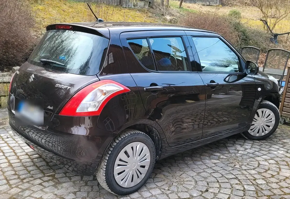 Gebraucht Suzuki Swift 93 PS (68 kW) 2013 Braun Kleinwagen