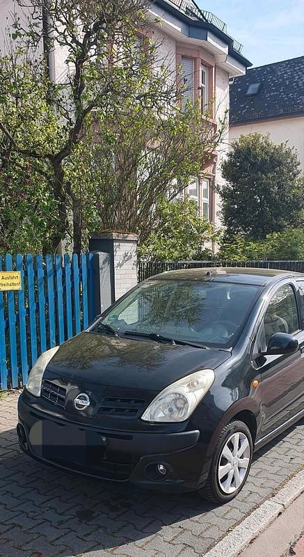 Gebraucht Nissan Pixo 68 PS (50 kW) 2012 Schwarz Kleinwagen