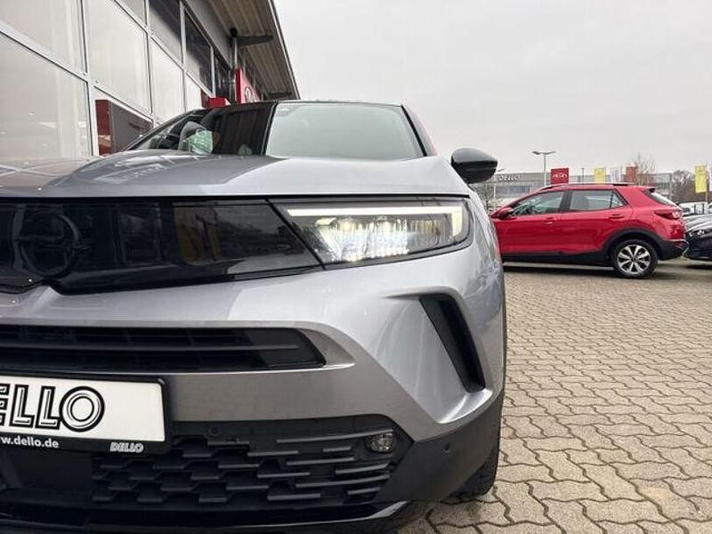 Gebraucht Opel Mokka 131 PS (96 kW) 2021 Kontrast grau/quarz silber SUV