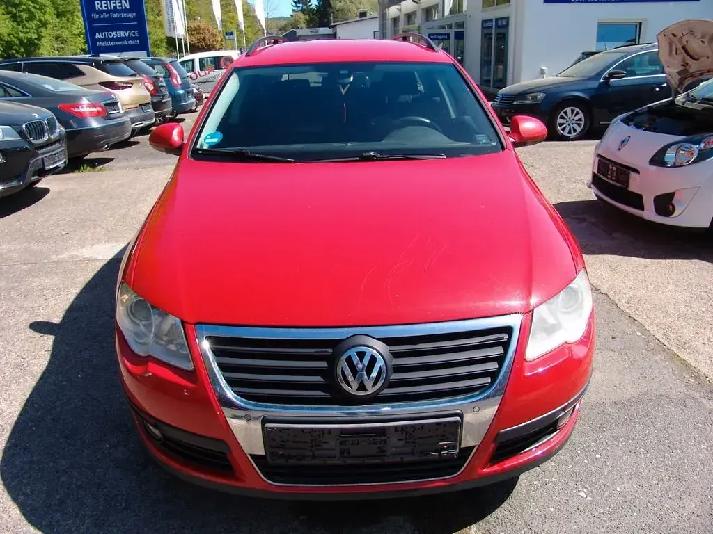 Second-hand VW Passat Trendline 105 CP (77 kW) 2010 Roșu Break