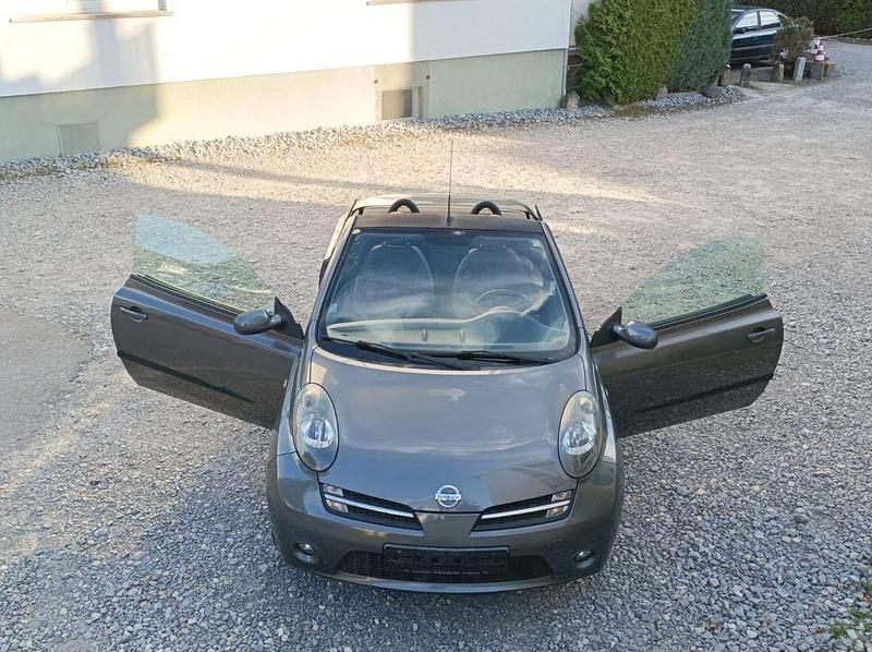 Vesuvgrau metallic Gebraucht 2006 Nissan Micra C+C Premium Edition Cabrio | 6.990 € (Etwas zu teuer) - Bild 1/4