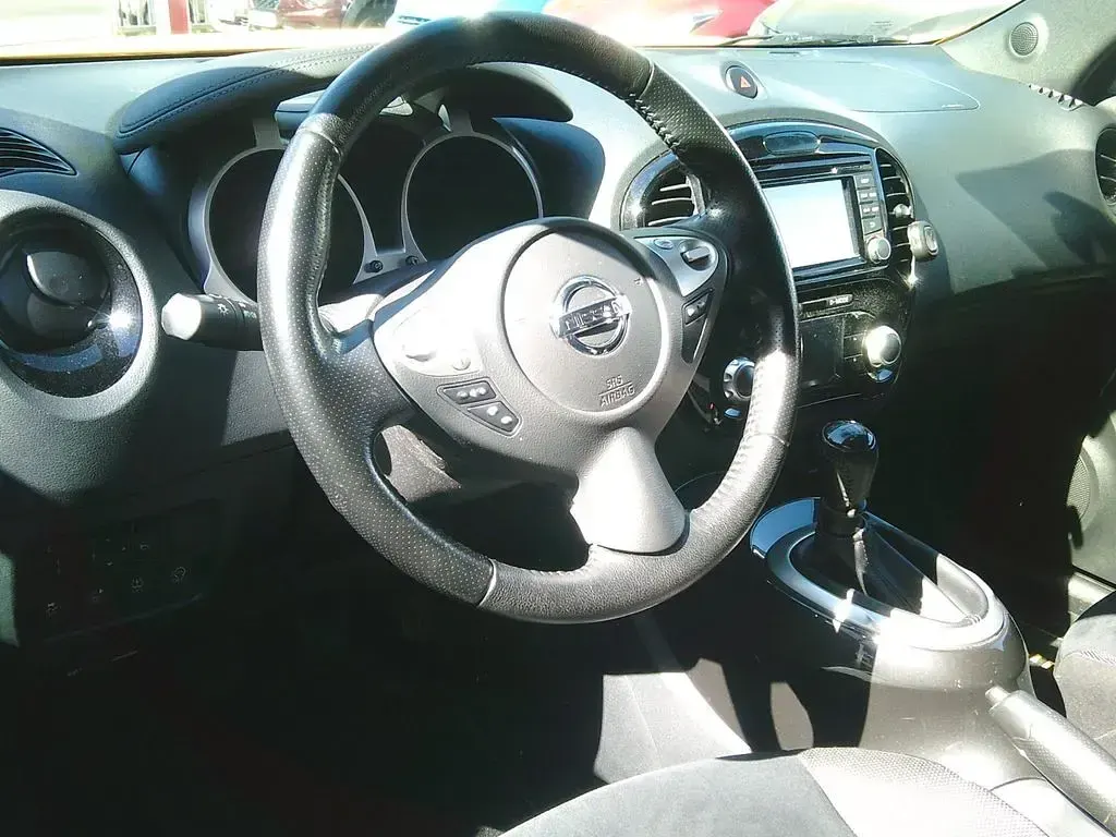 Gebraucht Nissan Juke Acenta 113 PS (83 kW) 2015 Gelb SUV
