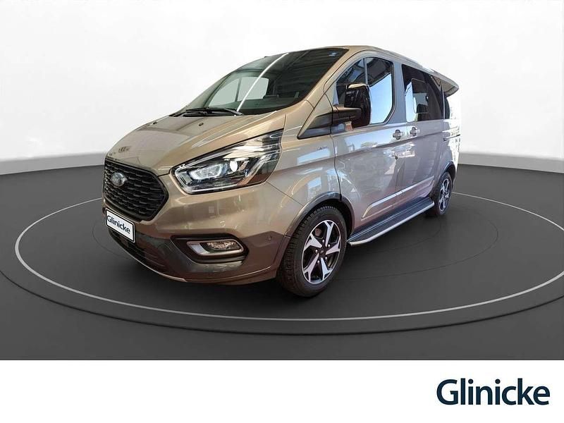 Pyritsilber metallic Gebraucht 2022 Ford Tourneo Custom Van / Kleinbus | 42.980 € - Bild 1/2