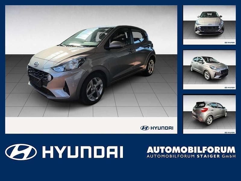 Brass / met Gebraucht 2023 Hyundai i10 Trend Kleinwagen | 16.390 € (Teuer) - Bild 1/4