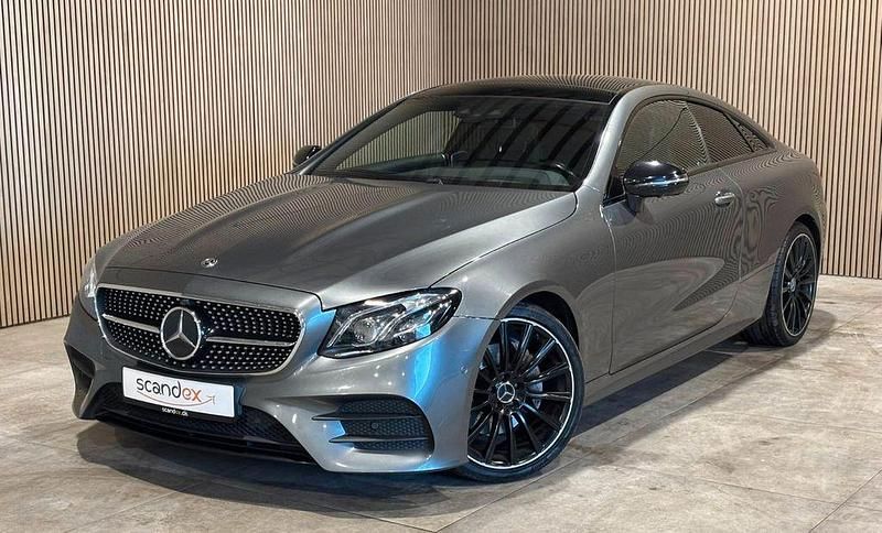 Grau Gebraucht 2019 Mercedes E220 AMG line Coupé | 24.500 € (Fairer Preis) - Bild 1/4