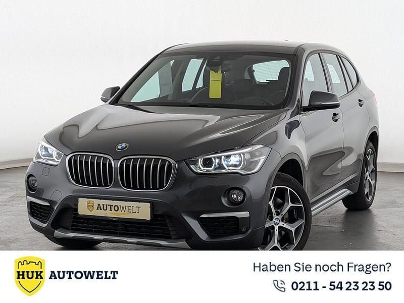 Grau Gebraucht 2015 BMW X1 xLine SUV | 18.560 € (Guter Preis) - Bild 1/3
