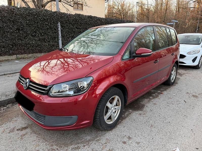 Gebraucht VW Touran Trendline 105 PS (77 kW) 2011 Rot Van / Kleinbus