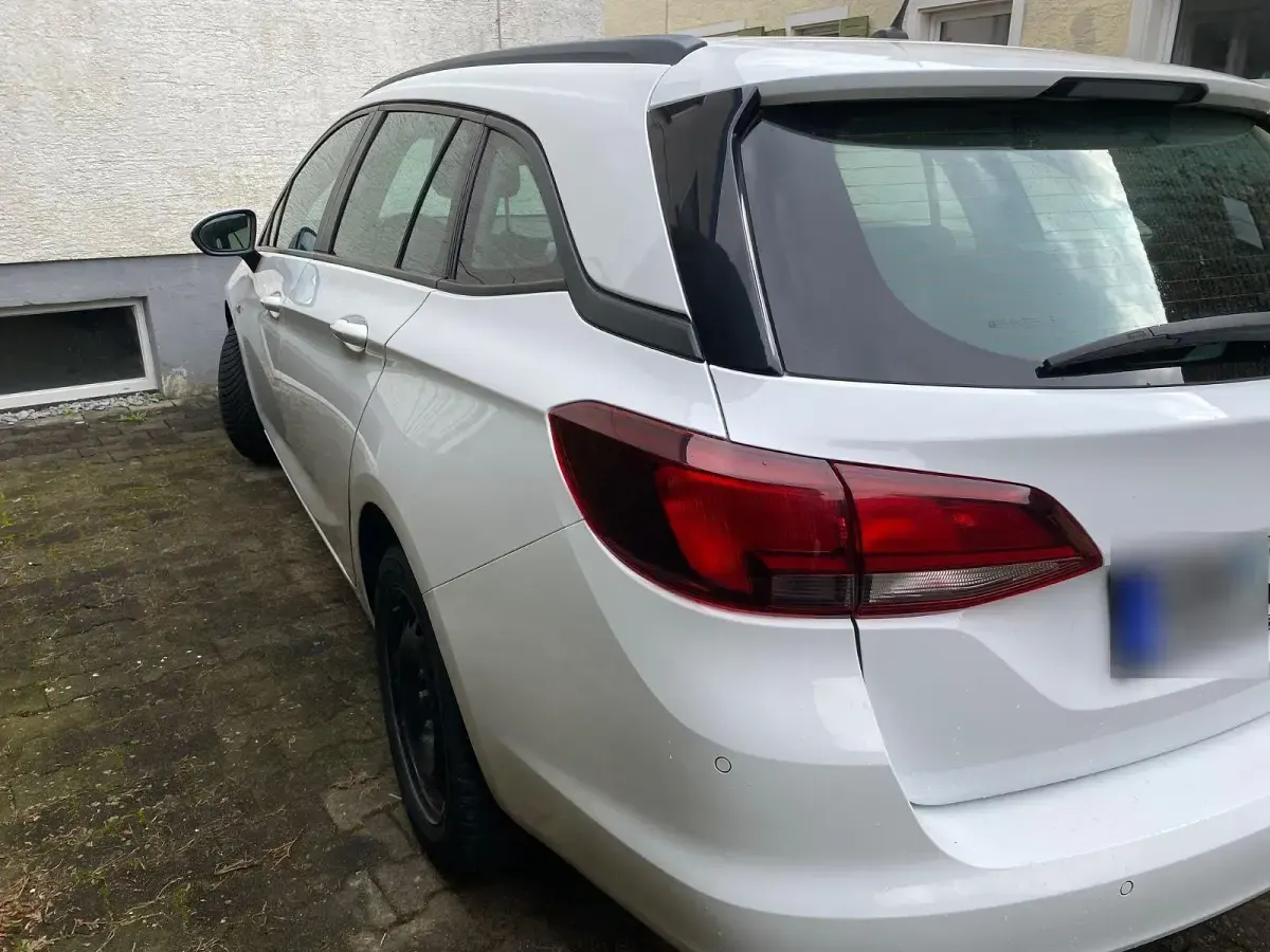 Używany Opel Astra Active 110 KM (80 kW) 2016 Biały Kombi