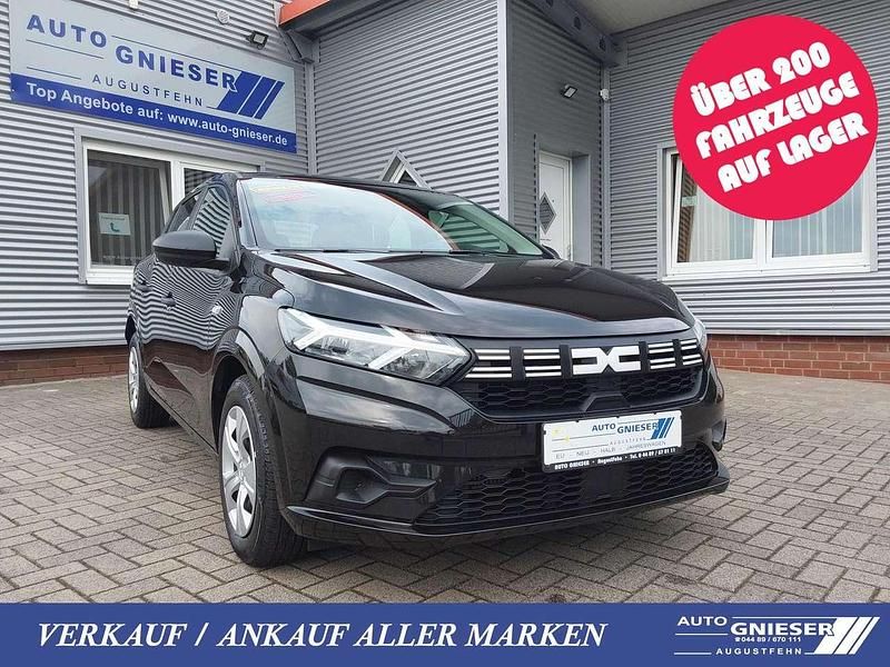 Perlmutt schwarz Gebraucht 2023 Dacia Sandero Essentiel Kleinwagen | 16.900 € (Fairer Preis) - Bild 1/4