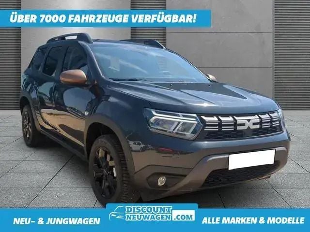 Kometengrau Gebraucht 2024 Dacia Duster Extreme SUV | 23.890 € (Superpreis) - Bild 1/4