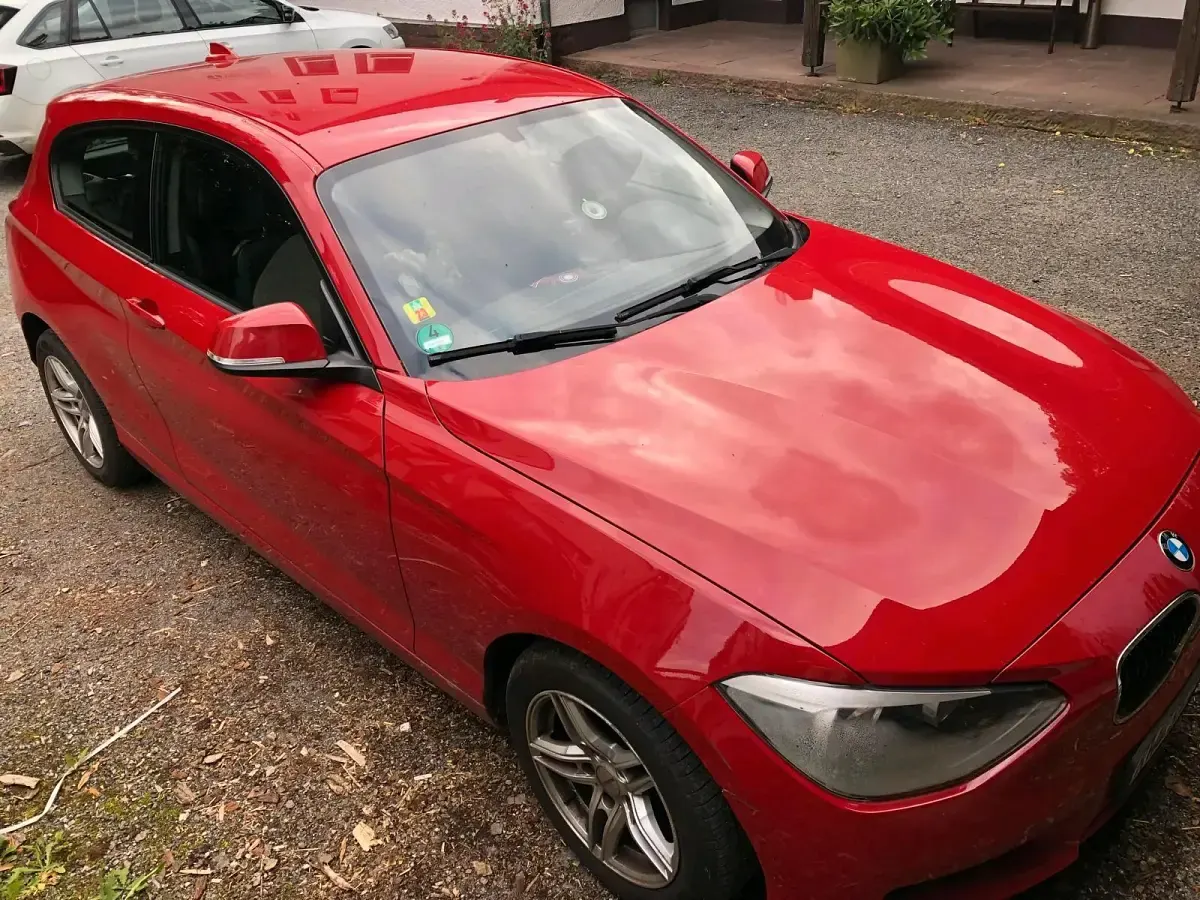 Gebraucht BMW 114 102 PS (75 kW) 2012 Rot Kleinwagen