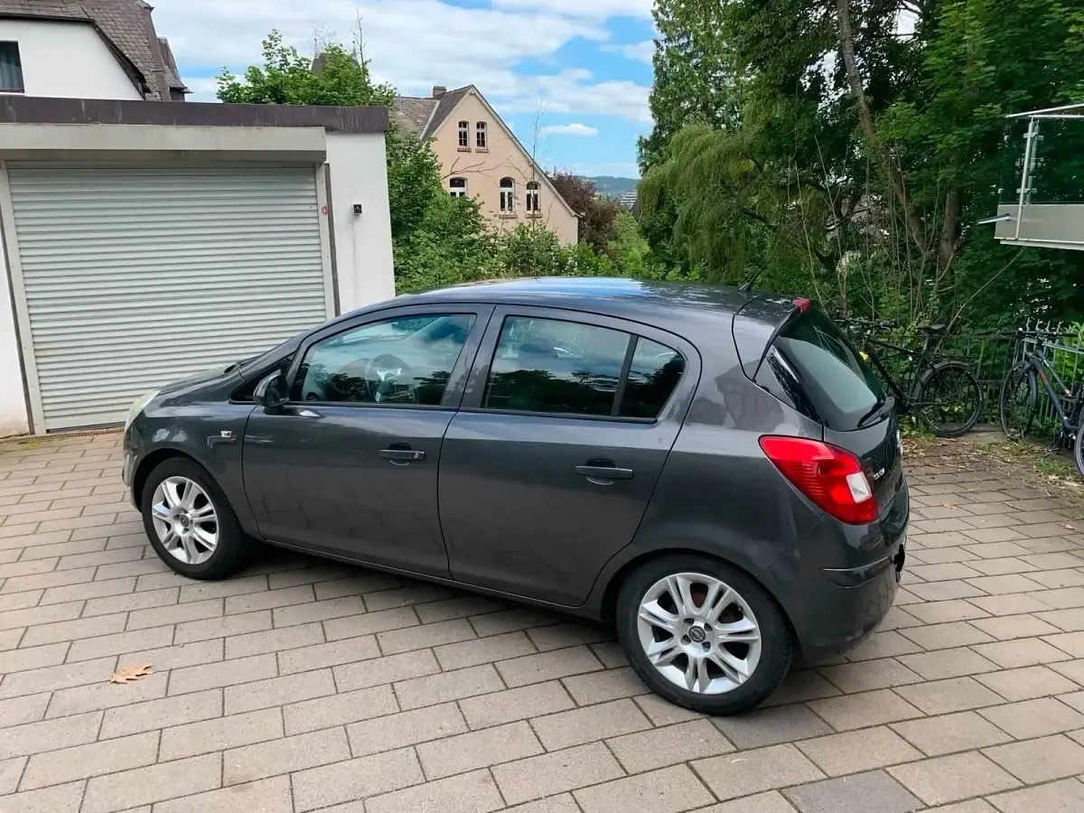 Gebraucht Opel Corsa 86 PS (63 kW) 2011 Grau Kleinwagen