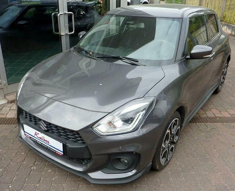 Grau Gebraucht 2023 Suzuki Swift Sport Limousine | 22.860 € (Fairer Preis) - Bild 1/4