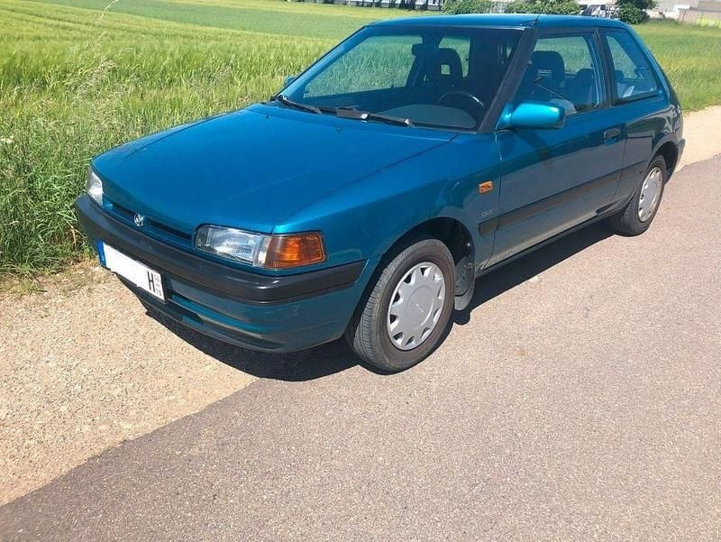 Blau Gebraucht 1992 Mazda 323 | 2.700 € - Bild 1/4