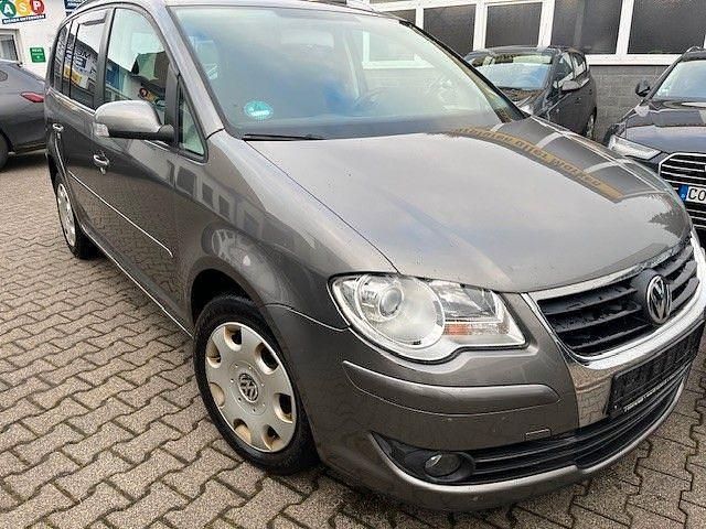 Braun Gebraucht 2007 VW Touran Van / Kleinbus | 3.500 € (Fairer Preis) - Bild 1/4