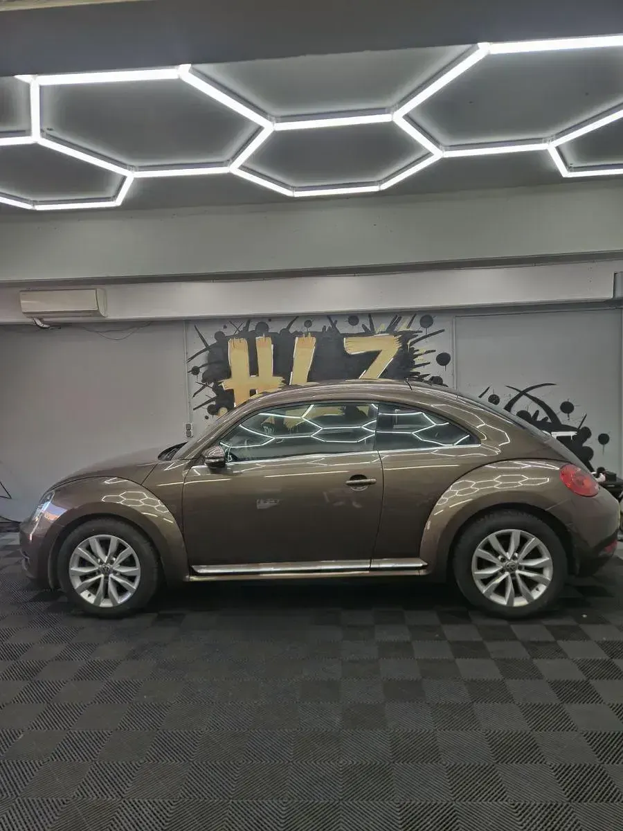 Gebraucht VW Beetle 105 PS (77 kW) 2011 Braun Kleinwagen