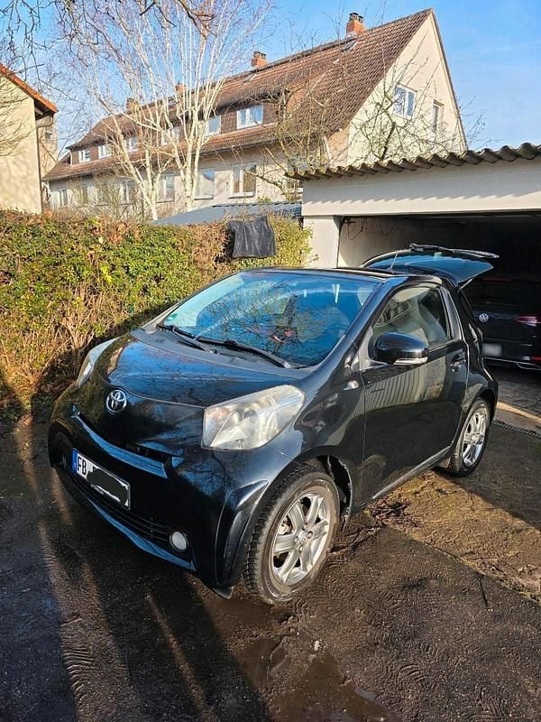 Gebraucht Toyota iQ 68 PS (50 kW) 2011 Schwarz Kleinwagen