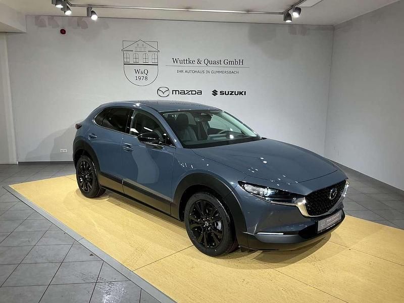 Machine gray Neu 2025 Mazda CX-30 Homura-Line SUV | 27.980 € - Bild 1/4