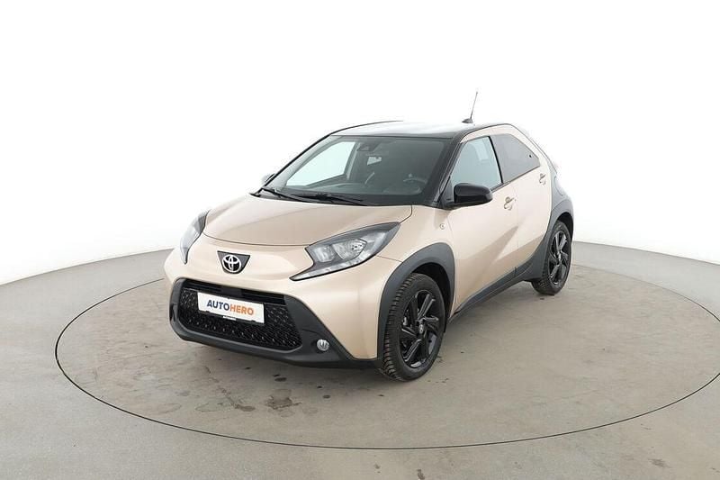 Braun Gebraucht 2024 Toyota Aygo X Team SUV | 17.210 € (Fairer Preis) - Bild 1/3