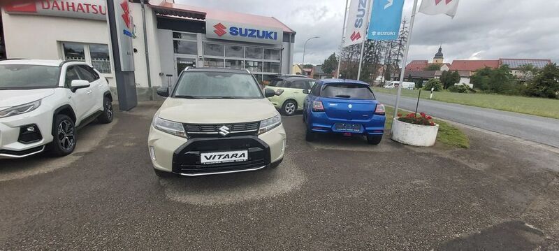 Beige Neu 2025 Suzuki Vitara Comfort SUV | 25.340 € (Fairer Preis) - Bild 1/4