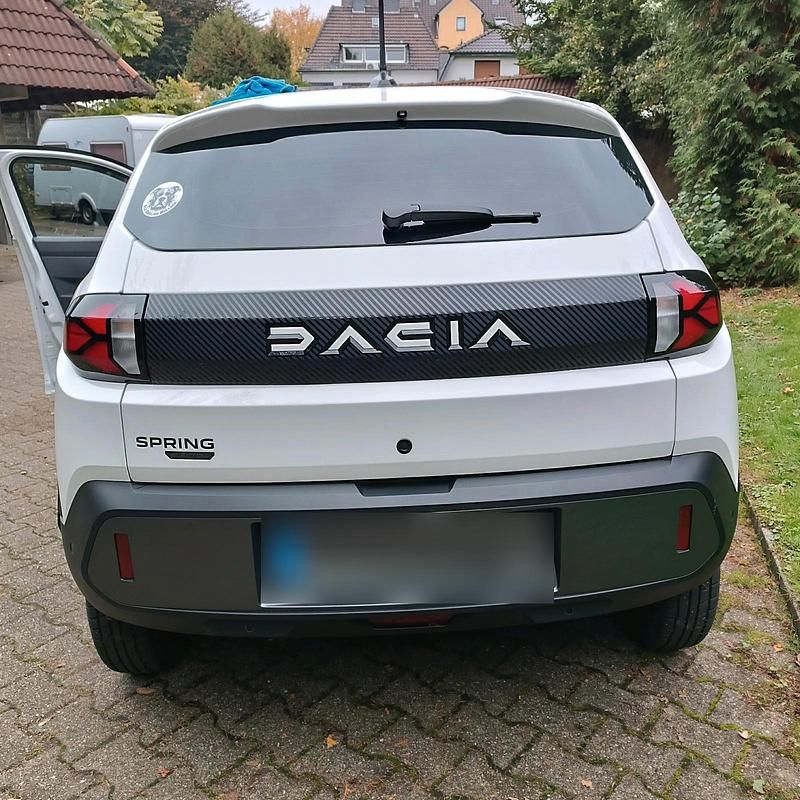 Gebraucht Dacia Spring Expression 44 kW (61 PS) 2025 Weiß Kleinwagen